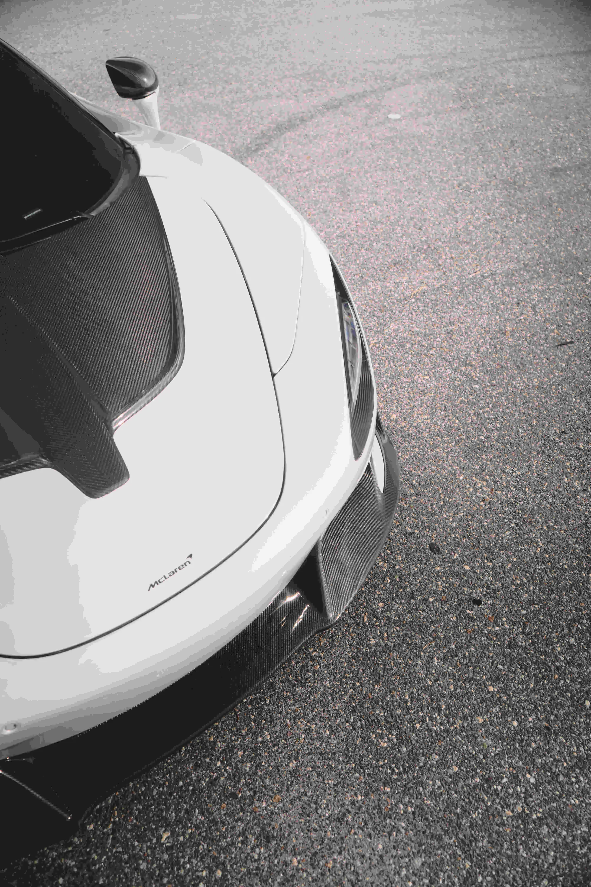 Supercar with its doors up outside Binson Rentals
